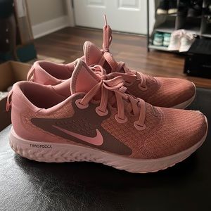 Pink Nike sneakers perfect for gym, running, or walking